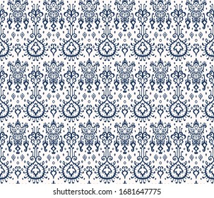 Ikat geometric folklore ornament. Oriental vector damask pattern. Ancient art of Arabesque. Tribal ethnic texture. Spanish motif on the carpet. Aztec style. Indian rug. Gypsy, Mexican embroidery.