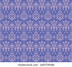 Ikat geometric folklore ornament. Oriental vector damask pattern. Ancient art of Arabesque. Tribal ethnic texture. Spanish motif on the carpet. Aztec style. Indian rug. Gypsy, Mexican embroidery
