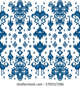 Ikat geometric folklore ornament. Oriental vector damask pattern. Ancient art of Arabesque. Tribal ethnic texture. Spanish motif on the carpet. Aztec style. Indian rug. Gypsy, Mexican embroidery.