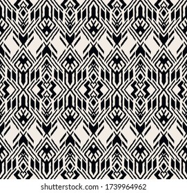 Ikat geometric folklore ornament. Oriental vector damask pattern. Ancient art of Arabesque. Tribal ethnic texture. Spanish motif on the carpet. Aztec style. Indian rug. Gypsy, Mexican embroidery.