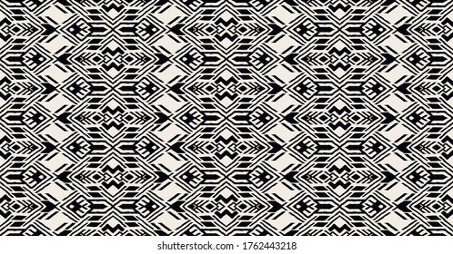 Ikat geometric folklore ornament. Oriental vector damask pattern. Ancient art of Arabesque. Tribal ethnic texture. Spanish motif on the carpet. Aztec style. Indian rug. Gypsy, Mexican embroidery.