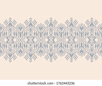 Ikat geometric folklore ornament. Oriental vector damask pattern. Ancient art of Arabesque. Tribal ethnic texture. Spanish motif on the carpet. Aztec style. Indian rug. Gypsy, Mexican embroidery.