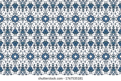 Ikat geometric folklore ornament. Oriental vector damask pattern. Ancient art of Arabesque. Tribal ethnic texture. Spanish motif on the carpet. Aztec style. Indian rug. Gypsy, Mexican embroidery.