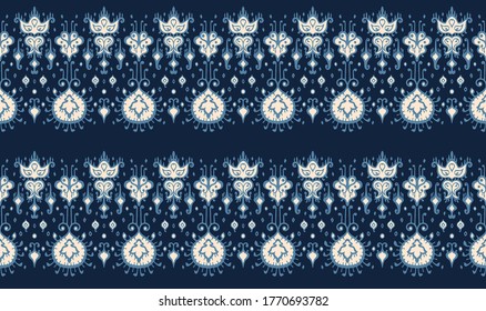 Ikat geometric folklore ornament. Oriental vector damask pattern. Ancient art of Arabesque. Tribal ethnic texture. Spanish motif on the carpet. Aztec style. Indian rug. Gypsy, Mexican embroidery.