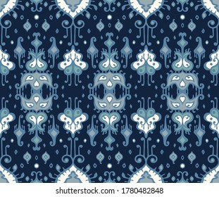 Ikat geometric folklore ornament. Oriental vector damask pattern. Ancient art of Arabesque. Tribal ethnic texture. Spanish motif on the carpet. Aztec style. Indian rug. Gypsy, Mexican embroidery.