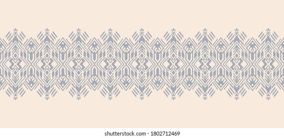 Ikat geometric folklore ornament. Oriental vector damask pattern. Ancient art of Arabesque. Tribal ethnic texture. Spanish motif on the carpet. Aztec style. Indian rug. Gypsy, Mexican embroidery.