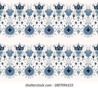 Ikat geometric folklore ornament. Oriental vector damask pattern. Ancient art of Arabesque. Tribal ethnic texture. Spanish motif on the carpet. Aztec style. Indian rug. Gypsy, Mexican embroidery.