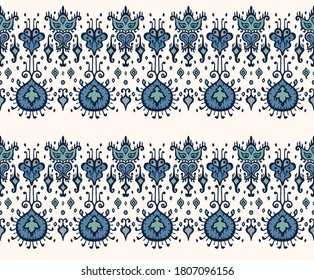 Ikat geometric folklore ornament. Oriental vector damask pattern. Ancient art of Arabesque. Tribal ethnic texture. Spanish motif on the carpet. Aztec style. Indian rug. Gypsy, Mexican embroidery.