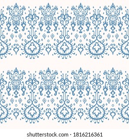 Ikat geometric folklore ornament. Oriental vector damask pattern. Ancient art of Arabesque. Tribal ethnic texture. Spanish motif on the carpet. Aztec style. Indian rug. Gypsy, Mexican embroidery.