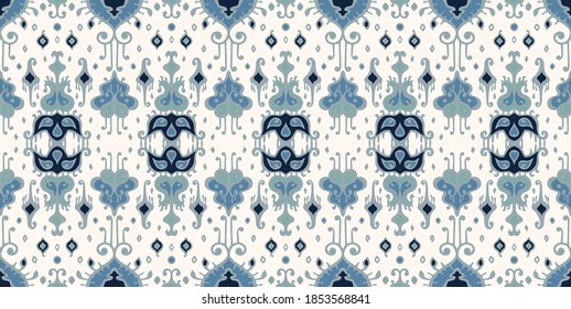 Ikat geometric folklore ornament. Oriental vector damask pattern. Ancient art of Arabesque. Tribal ethnic texture. Spanish motif on the carpet. Aztec style. Indian rug. Gypsy, Mexican embroidery.