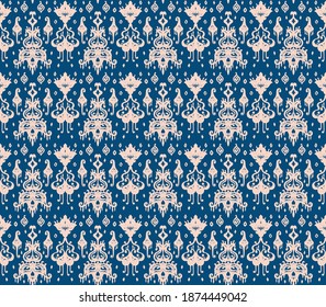 Ikat geometric folklore ornament. Oriental vector damask pattern. Ancient art of Arabesque. Tribal ethnic texture. Spanish motif on the carpet. Aztec style. Indian rug. Gypsy, Mexican embroidery.