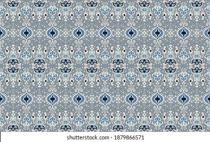 Ikat geometric folklore ornament. Oriental vector damask pattern. Ancient art of Arabesque. Tribal ethnic texture. Spanish motif on the carpet. Aztec style. Indian rug. Gypsy, Mexican embroidery.