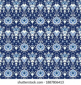 Ikat geometric folklore ornament. Oriental vector damask pattern. Ancient art of Arabesque. Tribal ethnic texture. Spanish motif on the carpet. Aztec style. Indian rug. Gypsy, Mexican embroidery.