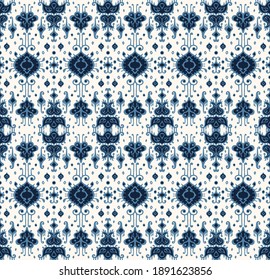 Ikat geometric folklore ornament. Oriental vector damask pattern. Ancient art of Arabesque. Tribal ethnic texture. Spanish motif on the carpet. Aztec style. Indian rug. Gypsy, Mexican embroidery.