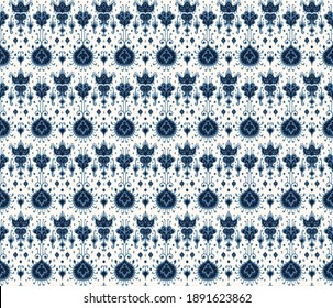 Ikat geometric folklore ornament. Oriental vector damask pattern. Ancient art of Arabesque. Tribal ethnic texture. Spanish motif on the carpet. Aztec style. Indian rug. Gypsy, Mexican embroidery.