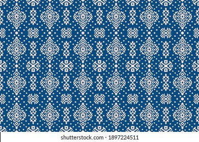 Ikat geometric folklore ornament. Oriental vector damask pattern. Ancient art of Arabesque. Tribal ethnic texture. Spanish motif on the carpet. Aztec style. Indian rug. Gypsy, Mexican embroidery.O