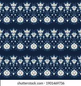 Ikat geometric folklore ornament. Oriental vector damask pattern. Ancient art of Arabesque. Tribal ethnic texture. Spanish motif on the carpet. Aztec style. Indian rug. Gypsy, Mexican embroidery.