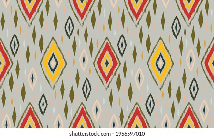 Ikat geometric folklore ornament. Oriental vector damask pattern. Ancient art of Arabesque. Tribal ethnic texture. Spanish motif on the carpet. Aztec style. Indian rug. Gypsy, Mexican embroidery.