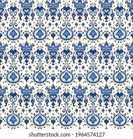 Ikat geometric folklore ornament. Oriental vector damask pattern. Ancient art of Arabesque. Tribal ethnic texture. Spanish motif on the carpet. Aztec style. Indian rug. Gypsy, Mexican embroidery.