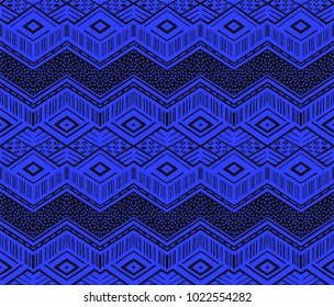 Ikat geometric folklore ornament. Tribal ethnic vector texture. Seamless striped  pattern in Aztec style. Figure tribal  embroidery. Indian, Scandinavian, Gypsy, Mexican, folk pattern. 