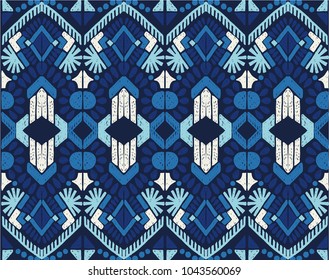 Ikat geometric folklore ornament. Tribal ethnic vector texture. Seamless striped  pattern in Aztec style. Figure tribal  embroidery. Indian, Scandinavian, Gypsy, Mexican, folk pattern. 