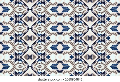 Ikat geometric folklore ornament. Tribal ethnic vector texture. Seamless striped  pattern in Aztec style. Figure tribal  embroidery. Indian, Scandinavian, Gypsy, Mexican, folk pattern. 