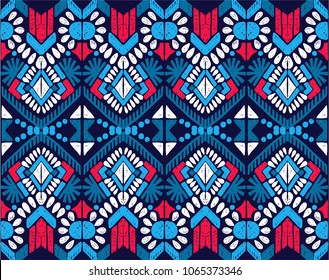 Ikat geometric folklore ornament. Tribal ethnic vector texture. Seamless striped  pattern in Aztec style. Figure tribal  embroidery. Indian, Scandinavian, Gypsy, Mexican, folk pattern. 