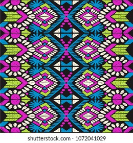 Ikat geometric folklore ornament. Tribal ethnic vector texture. Seamless striped  pattern in Aztec style. Figure tribal  embroidery. Indian, Scandinavian, Gypsy, Mexican, folk pattern. 