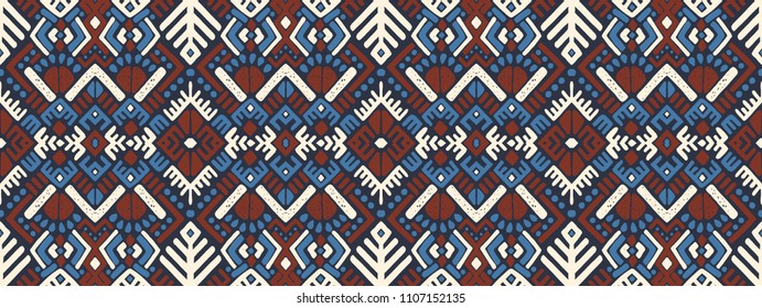 Ikat geometric folklore ornament. Tribal ethnic vector texture. Seamless striped  pattern in Aztec style. Figure tribal  embroidery. Indian, Scandinavian, Gypsy, Mexican, folk pattern. 