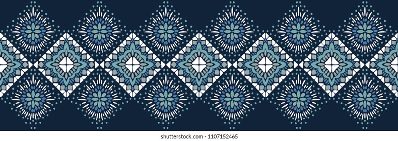 Ikat geometric folklore ornament. Tribal ethnic vector texture. Seamless striped pattern in Aztec style. Figure tribal embroidery. Indian, Scandinavian, Gypsy, Mexican, folk pattern. 