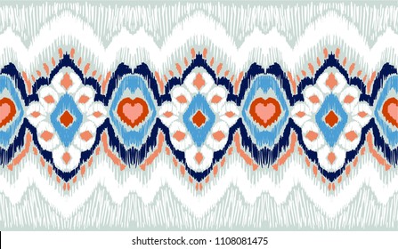 Ikat geometric folklore ornament. Tribal ethnic vector texture. Seamless striped pattern in Aztec style. Figure tribal embroidery. Indian, Scandinavian, Gypsy, Mexican, folk pattern.