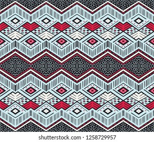 Ikat geometric folklore ornament. Tribal ethnic vector texture. Seamless striped  pattern in Aztec style. Figure tribal  embroidery. Indian, Scandinavian, Gypsy, Mexican, folk pattern. 