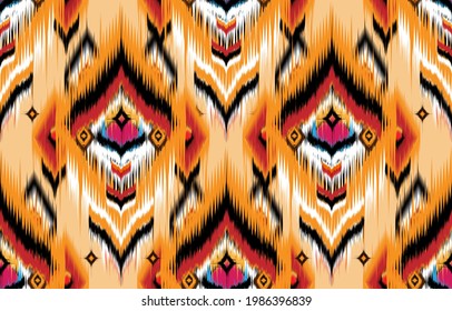 Ikat geometric folklore ornament. Tribal ethnic vector texture. Seamless striped pattern in Aztec style. Figure tribal embroidery. Indian, Scandinavian, Gyp sy, Mexican, folk pattern,Kente Cloth.