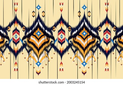 Ikat geometric folklore ornament. Tribal ethnic vector texture. 
Seamless striped pattern in Aztec style. Figure tribal embroidery. 
Indian, Scandinavian, Gypsy, Mexican, folk pattern,Kente Cloth.