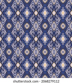 Ikat geometric folklore ornament. Tribal ethnic vector texture. Seamless striped  pattern in Aztec style. Figure tribal  embroidery. Indian, Scandinavian, Gypsy, Mexican, folk pattern. 