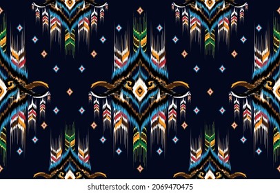 Ikat geometric folklore ornament. Tribal ethnic vector texture. Seamless striped pattern in Aztec style. Figure tribal embroidery. Indian, Scandinavian, Gypsy, Mexican, folk pattern.
