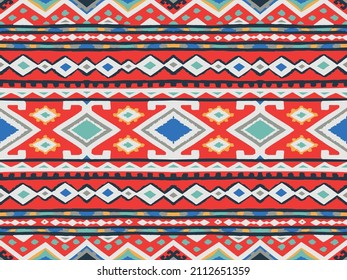 Ikat geometric folklore ornament. Tribal ethnic vector texture. Seamless striped pattern in Aztec style. Figure tribal embroidery. Indian, Scandinavian, Gypsy, Mexican, folk pattern.