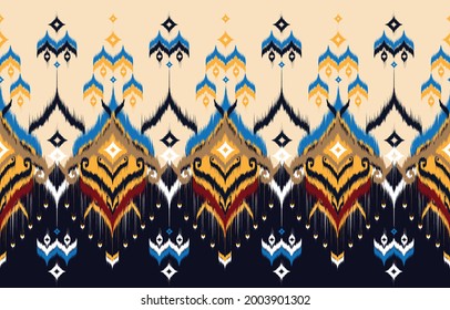 Ikat geometric folklore ornament.Seamless African pattern. Ethnic carpet with chevrons. 
Aztec style. Geometric mosaic on the tile, majolica. Ancient interior. 
Modern rug. Geo print on textile.