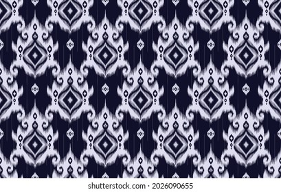 Patrón étnico indio geométrico Ikat. Moqueta de tela azteca mandala adorno boho chevron decoración textil papel de pared. Tradicional bordado alfombras tribales ornamentos vectoriales ilustraciones de fondo.