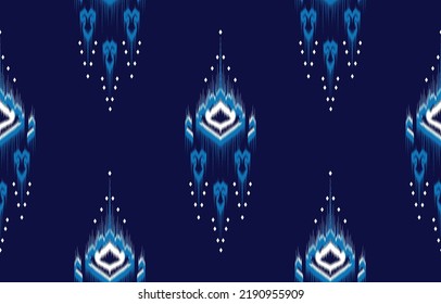 Ikat diseño geométrico de patrones étnicos orientales.
diseño de ikat para patrones étnicos tela de costura boho textil o geométrica nativa y tejido tipo ikat estilo vectorial de papel tapiz de ilustrador. ikat decorativo. 