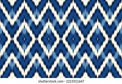 Ikat geometric ornament with diamonds. Ikkat. Seamless pattern. Aztec style. Tribal ethnic vector texture. Folk embroidery, Indian, Scandinavian, Gypsy, Mexican, African rug, wallpaper.