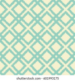 Ikat geometric seamless pattern with diagonal squares. Ikat ornament in vintage teal and cream colors. Good for design of greeting cards, wedding invitations, home decor, textile and wrapping paper.