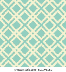 Ikat geometric seamless pattern with diagonal squares. Ikat ornament in vintage teal and cream colors. Good for design of greeting cards, wedding invitations, home decor, textile and wrapping paper.