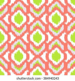 Ikat geometric seamless pattern. Green and coral color collection. Indonesian textile fabric tie-dye technique inspiration. Rhombus and drop shapes.