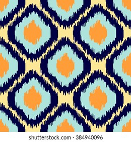 Ikat geometric seamless pattern. Orange and blue colors collection. Indonesian textile fabric tie-dye technique inspiration. Rhombus and drop shapes.