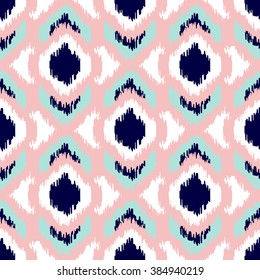 Ikat geometric seamless pattern. Pink and blue colors collection. Indonesian textile fabric tie-dye technique inspiration. Rhombus and drop shapes.