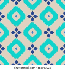 Ikat geometric seamless pattern. Turquoise color collection. Indonesian textile fabric tie-dye technique inspiration. Rhombus and drop shapes.