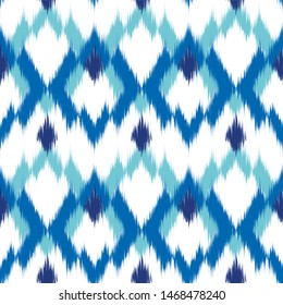 Ikat geometric seamless texture. Abstract background.