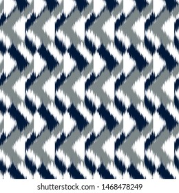 Ikat geometric seamless texture. Abstract background.