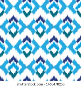 Ikat geometric seamless texture. Abstract background.